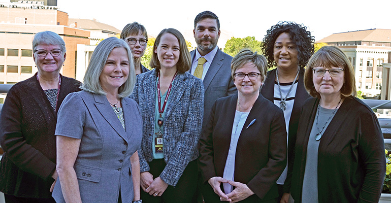 Leaders from the University of Minnesota School of Nursing and Saint Paul college after new partnership announced