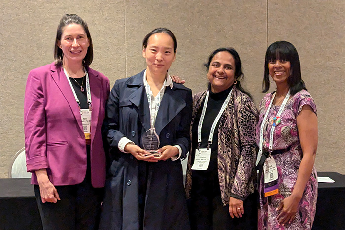 Kate Cartwright, APHA Health Administration Section recognition committee chair, PhD student Chanhee Kim, Associate Professor Sripriya Rajamani and Takiyah R. Wilson, APHA Health Administration Section chair.