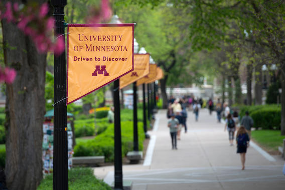 University of Minnesota - Driven to Discover banners along a walkway