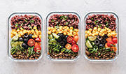 Healthy prepared meals in three bowls